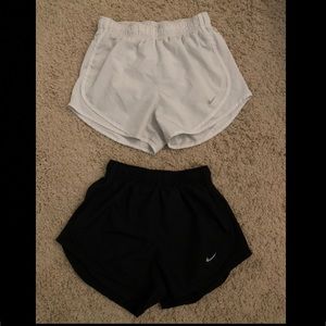 2 pairs of XS nike shorts. black and white pair